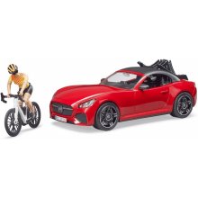 Auto Roadster red with a figurine and a...